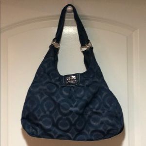 Denim authentic Coach handbag.   Silver coach C ‘s